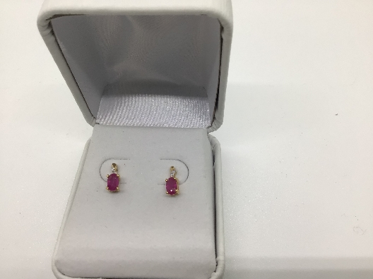 14ky Ruby earrings with .02 tdw  OTH