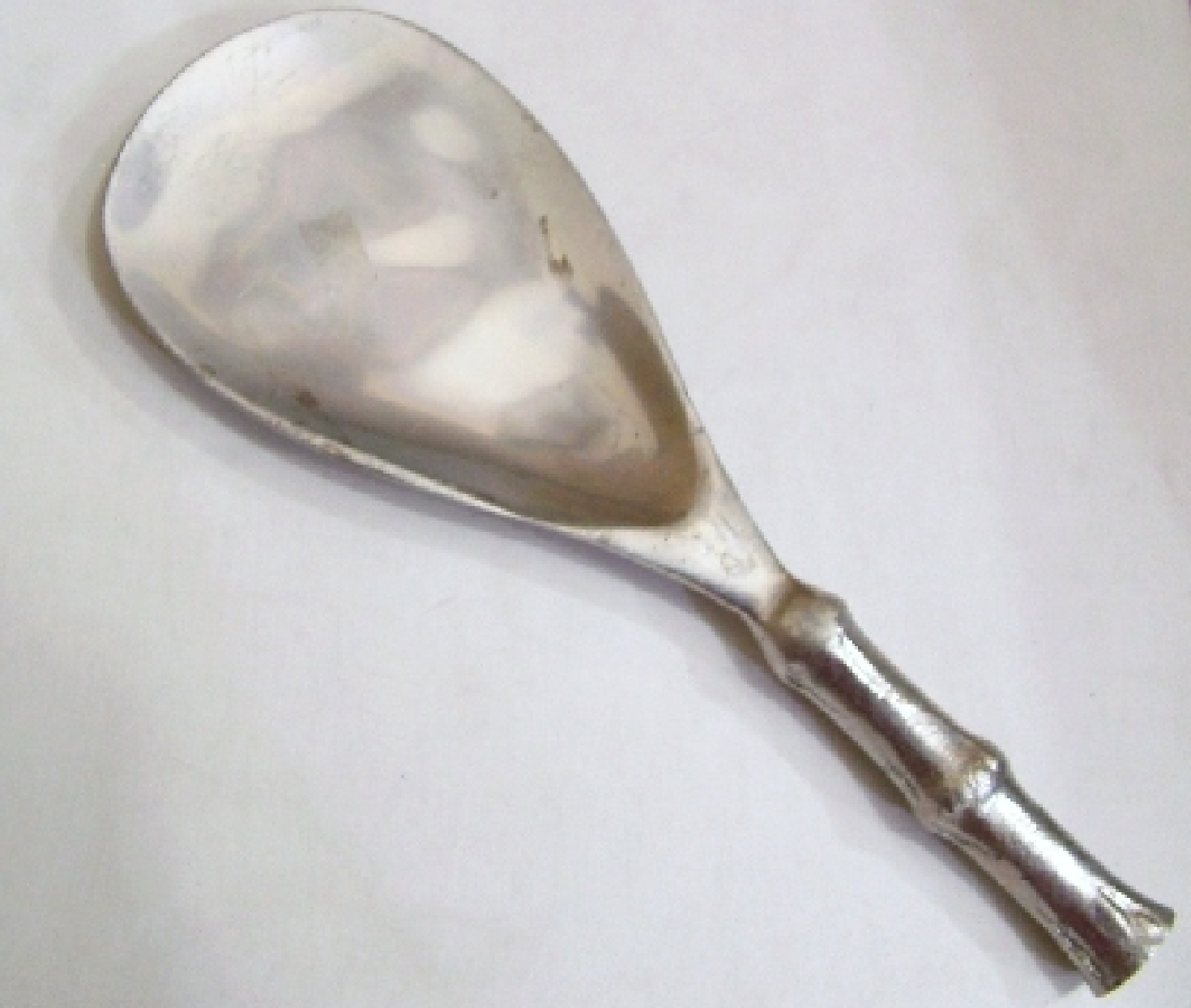 Silvertone spoon rest