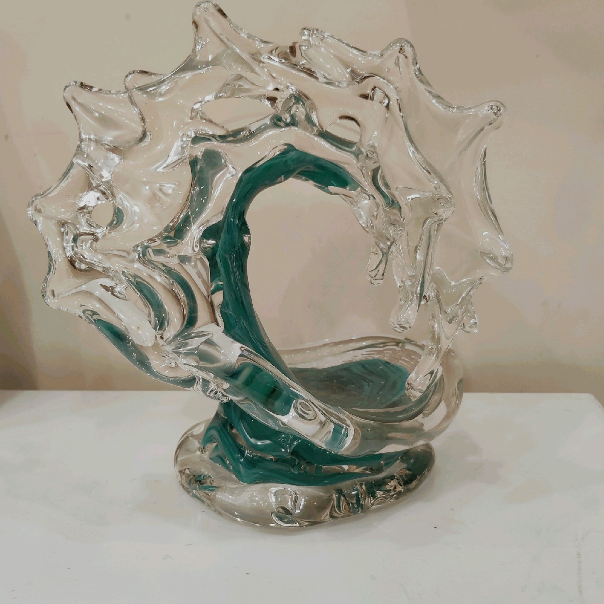 David Wight Double Tsunami Turquoise Glass Sculpture

Comes with Lighted Box Display Stand