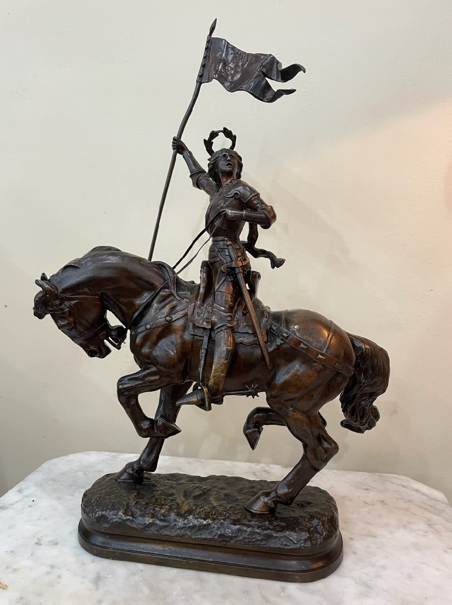 19th Century French Bronze Sculpture of Joan of Arc on Horse Back by the French Sculpter; Adrien Etienne Gaudez. Joan of Arc is Carrying a Flag That Reads   Dieu; Patrie   Which Translates to   God; Homeland  .