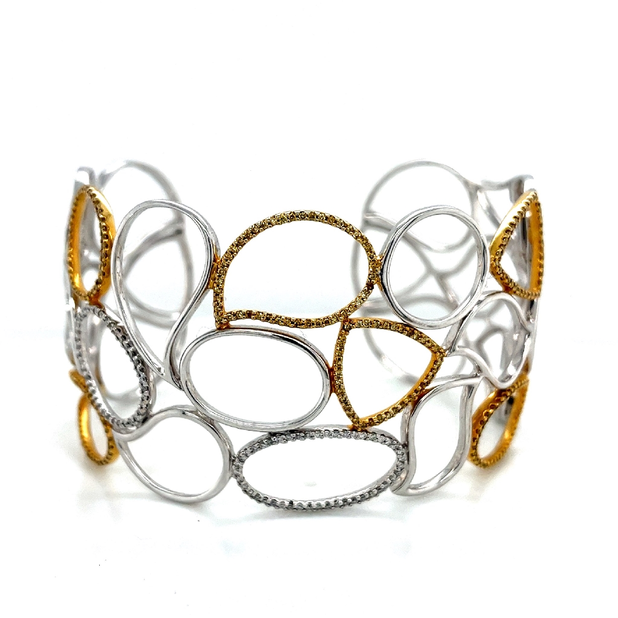 18K White Gold and Yellow Gold Hinged Cuff with White and Yellow Diamonds 

Fits a 7-7.5 Inch Wrist