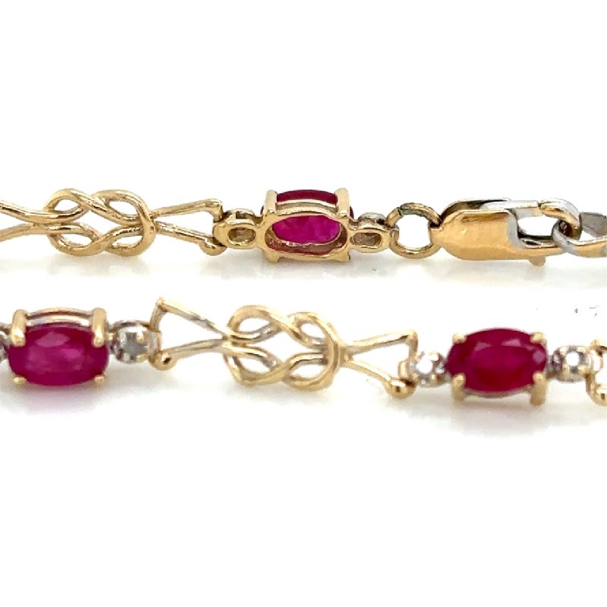 14K Yellow Gold Bracelet with Oval Rubies 2CT and Diamond .1CT Accents

7 Inch Bracelet