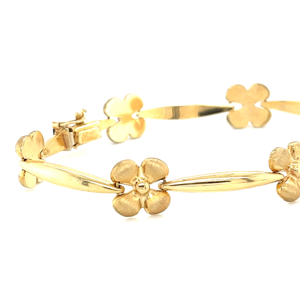 14kt yellow gold clover link bracelet at 7.5 inches