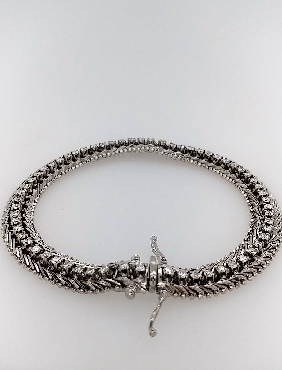 14K White Gold Diamond Line Bracelet with Mid-Century Weave Link 8
Bracelet Contains 62 RBC Diamonds; measuring approximately 0.20 mm
Approximately 2.0CTTW G-H/VS