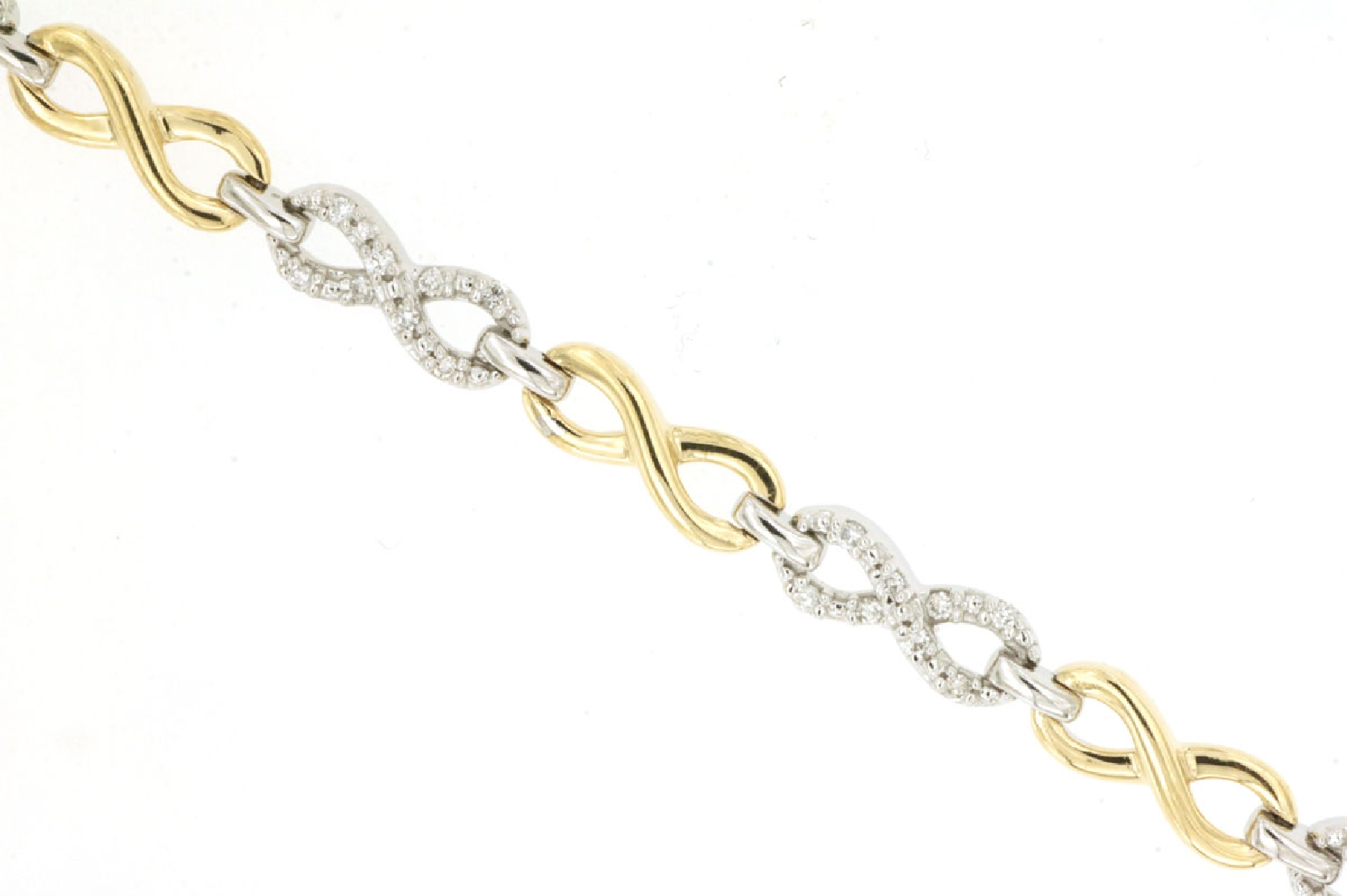 14K Two Tone Gold Infinity Link Bracelet with Diamond Accents and Lobster Clasp

7.5 Inch 
0.26cttw Diamonds