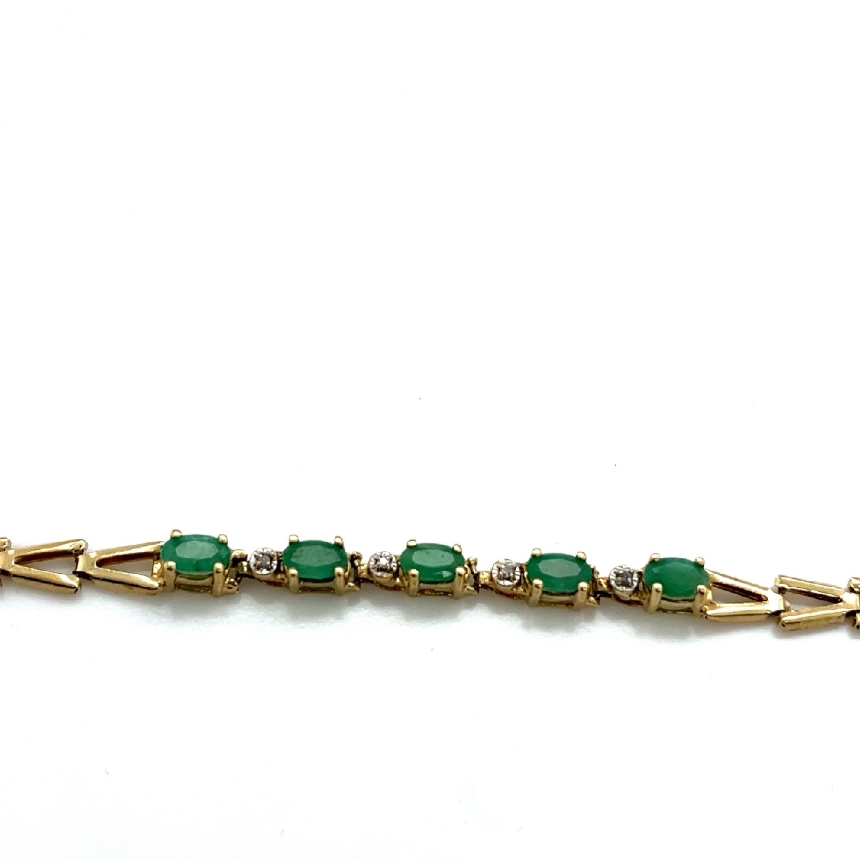 10K Yellow Gold Emerald and Diamond Accented Bracelet
7 Inches