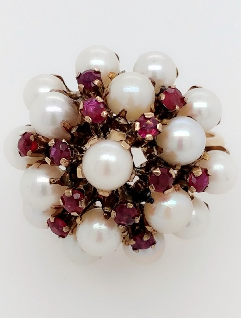 14kt yellow gold vintage pearl and rubellite set in floral fashion
size 6.25
