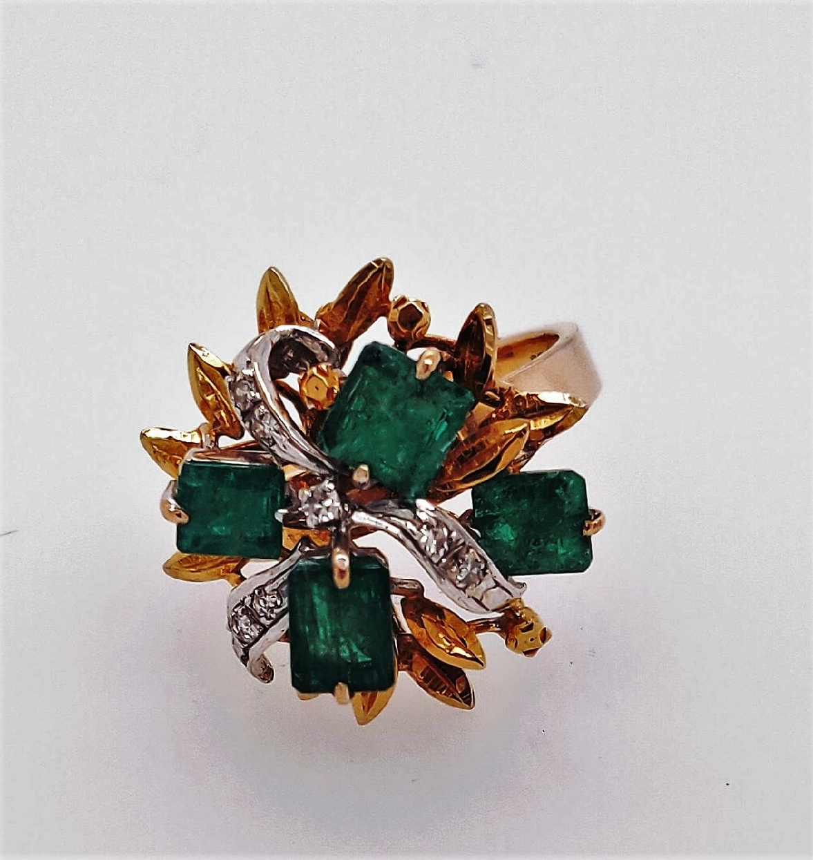 14k Two-tone Gold Ring with Emeralds and Diamond accents
size 6.25