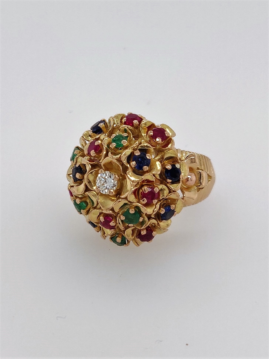 18K Yellow Gold Floral Cluster Ring with 6 Sapphires; 7 Rubies; and 5 Emeralds. .15CT Diamond in Center with F-G in Color and VS-2 in clarity. Size 4