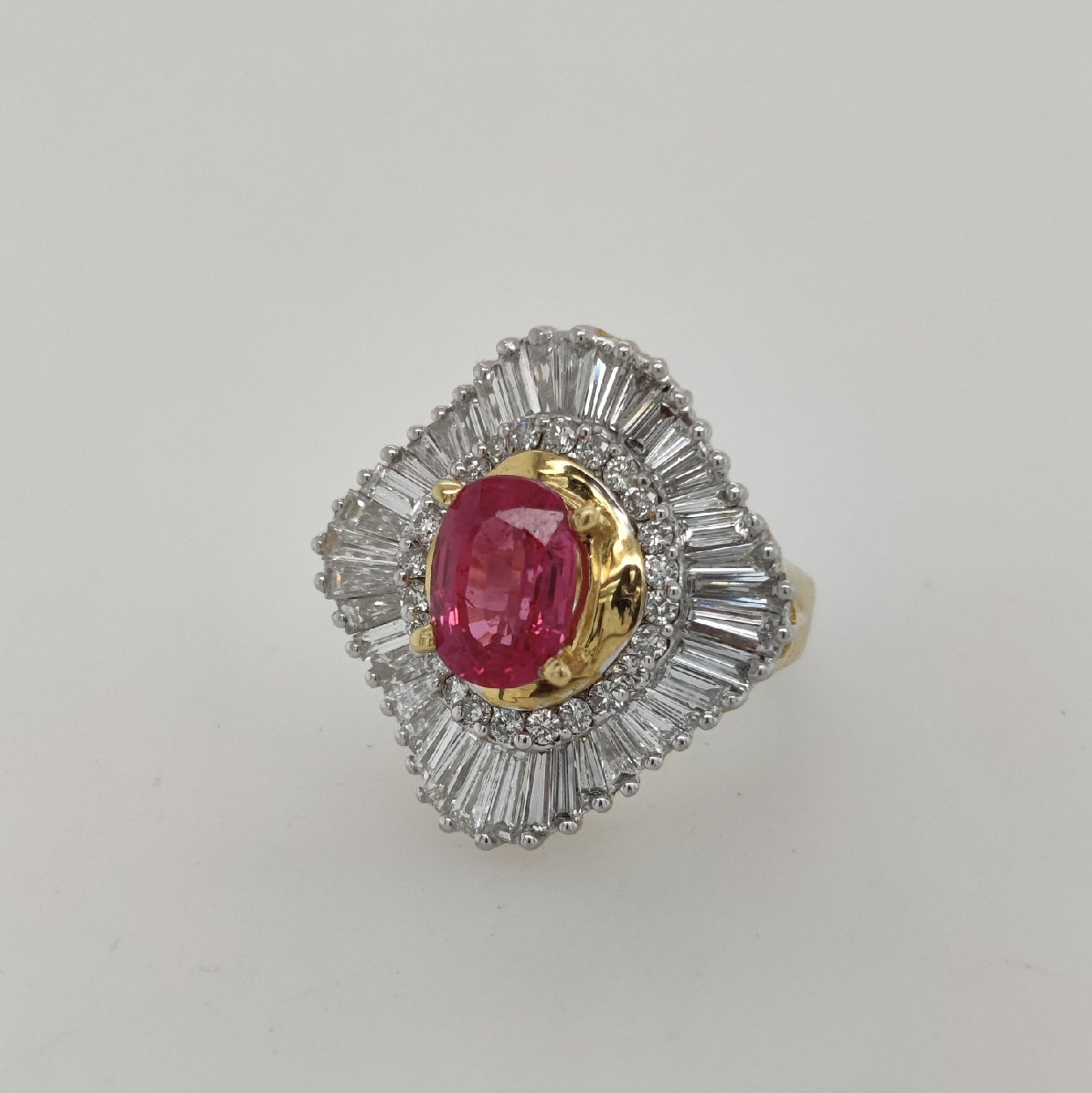 18k Yellow Gold Ruby Ring with Round Diamonds and Diamond Baguette Halo Size 5.5

Ruby Weighs Approximately 2.25CT
Diamonds Weigh Approximately 5.5 CTTW; G-H/VS1-2