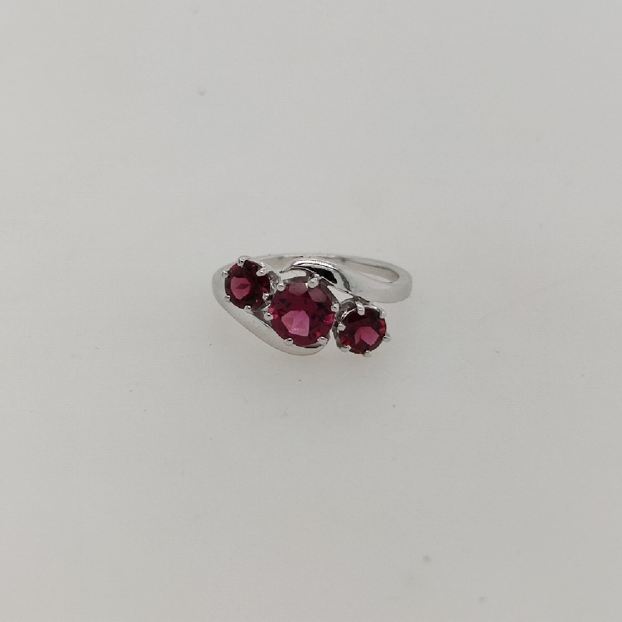 14K White Gold Bypass Style Ring with 3 Rhodolite Garnets; Size 6.75 