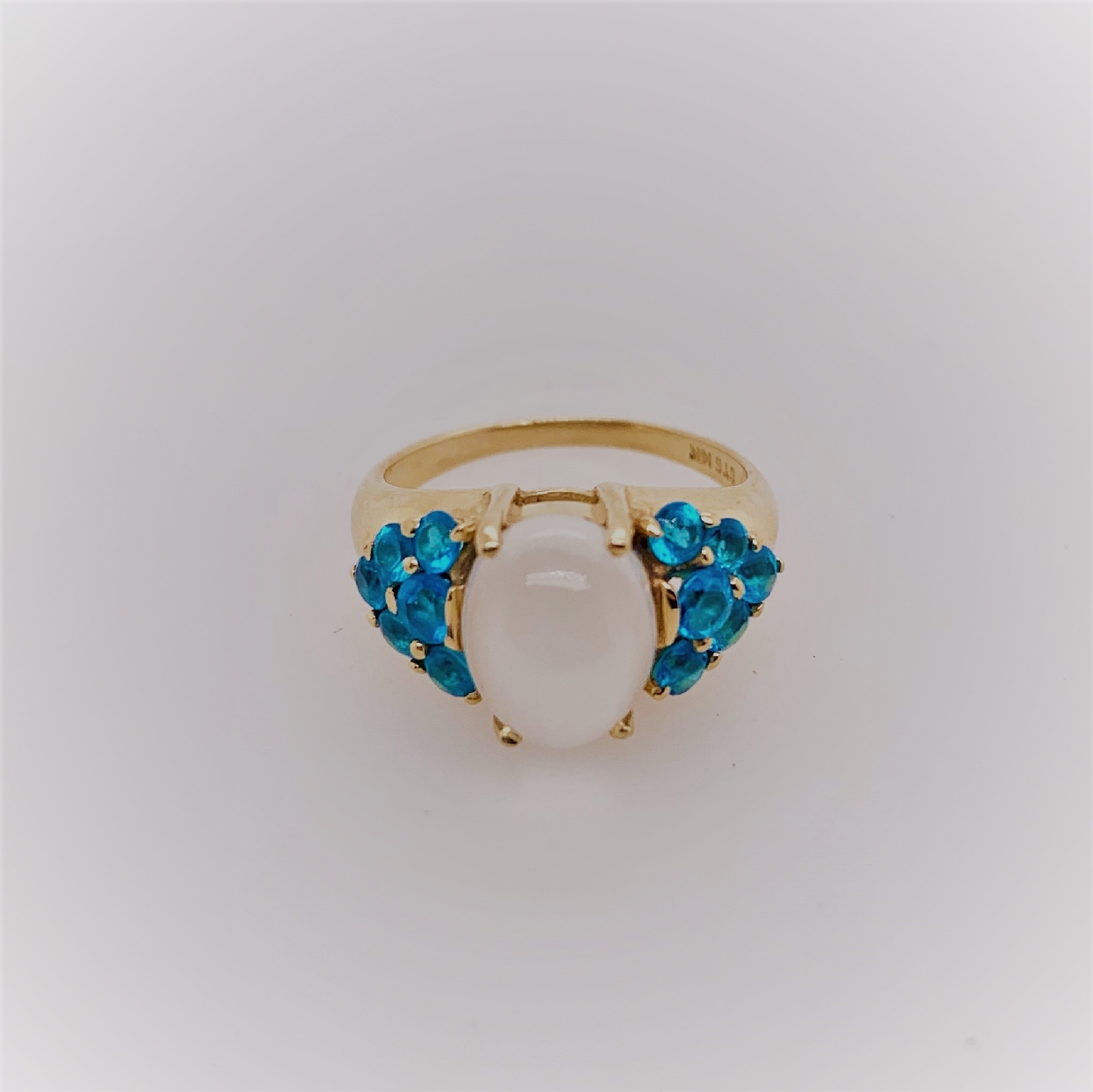 14K Yellow Gold Cabachon Cut Moonstone Ring with Blue Apatite Accents; Size 6.25
