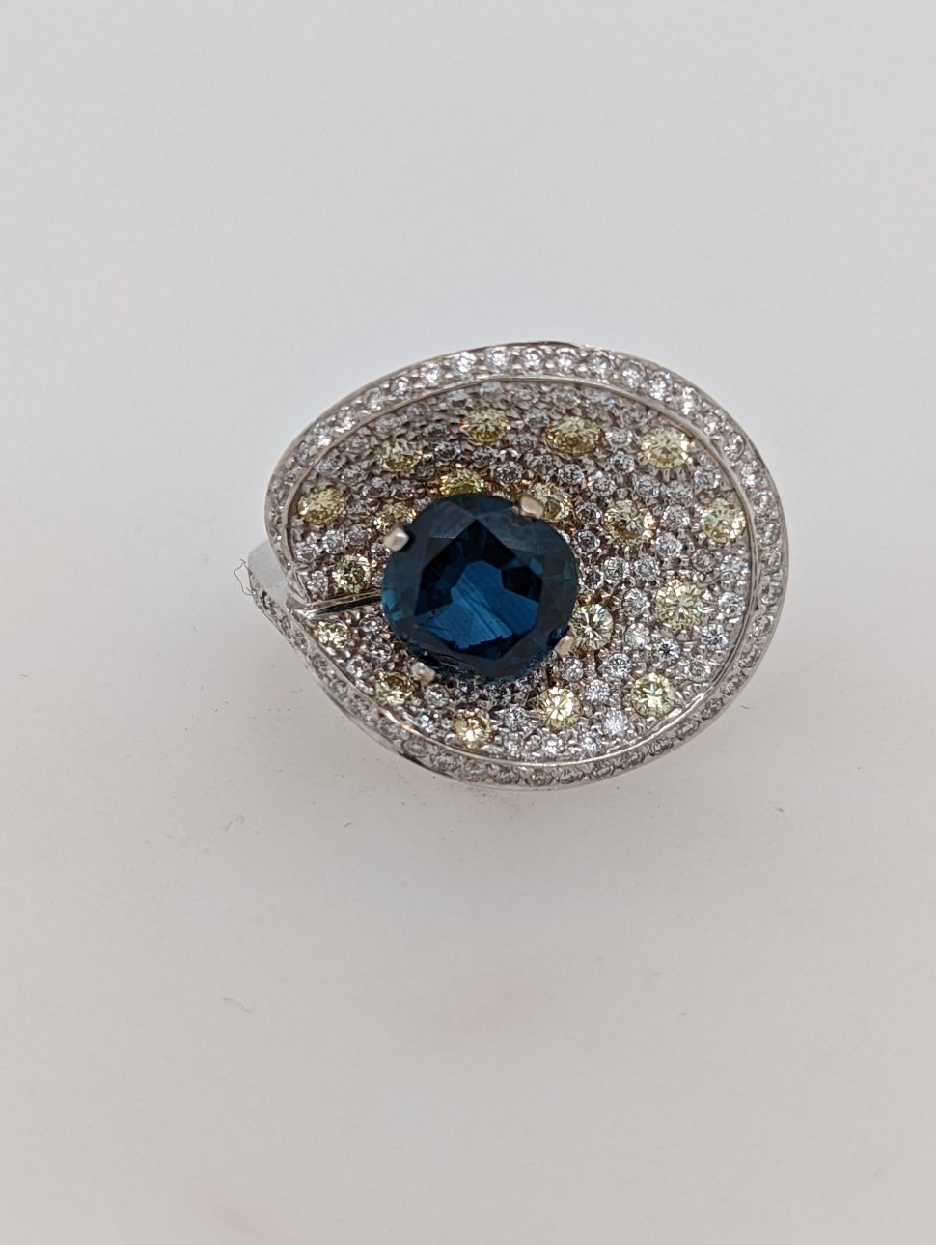 18K White Gold Sapphire and Diamond Cocktail Ring; Size 6.5
Sapphire is Approximately 2.5CT 

AGL Report on File