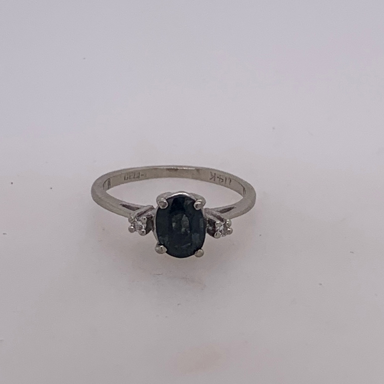 14K White Gold Ring with Oval Sapphire and Accent Diamonds 

Size 6