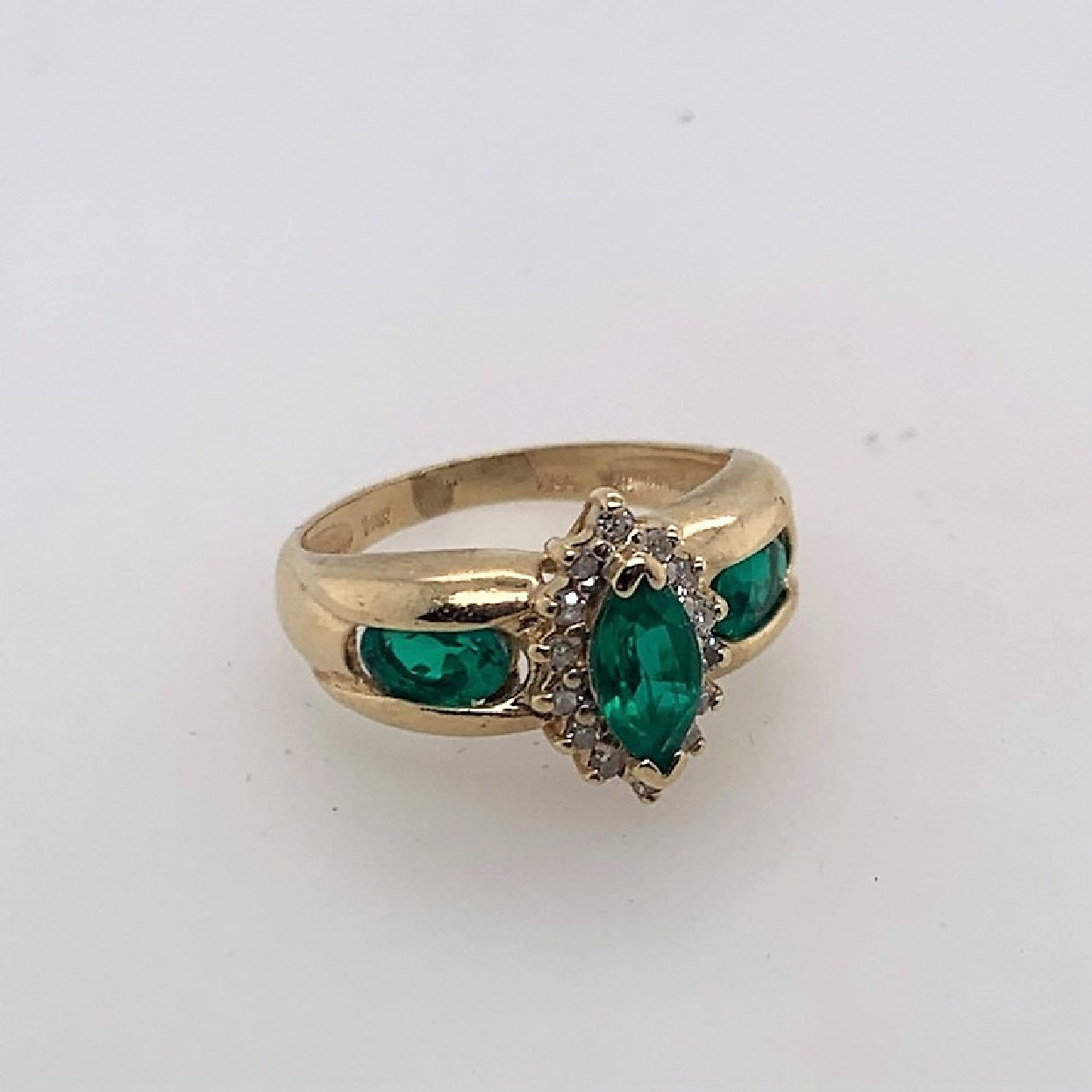 14K Yellow Gold Ring with Marquise Shaped Synthetic Emerald with Diamond Halo and Two Synthetic Emerald Accents; Size 6.25