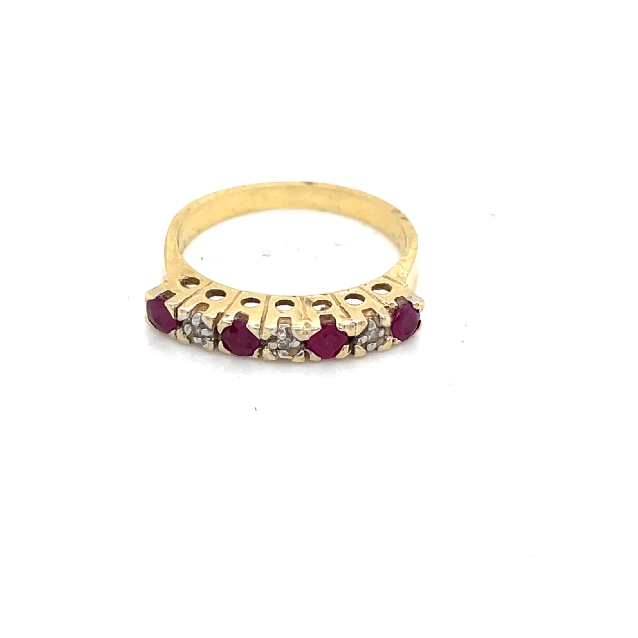14k Yellow Gold Ruby and Diamond Ring

Size 6.75