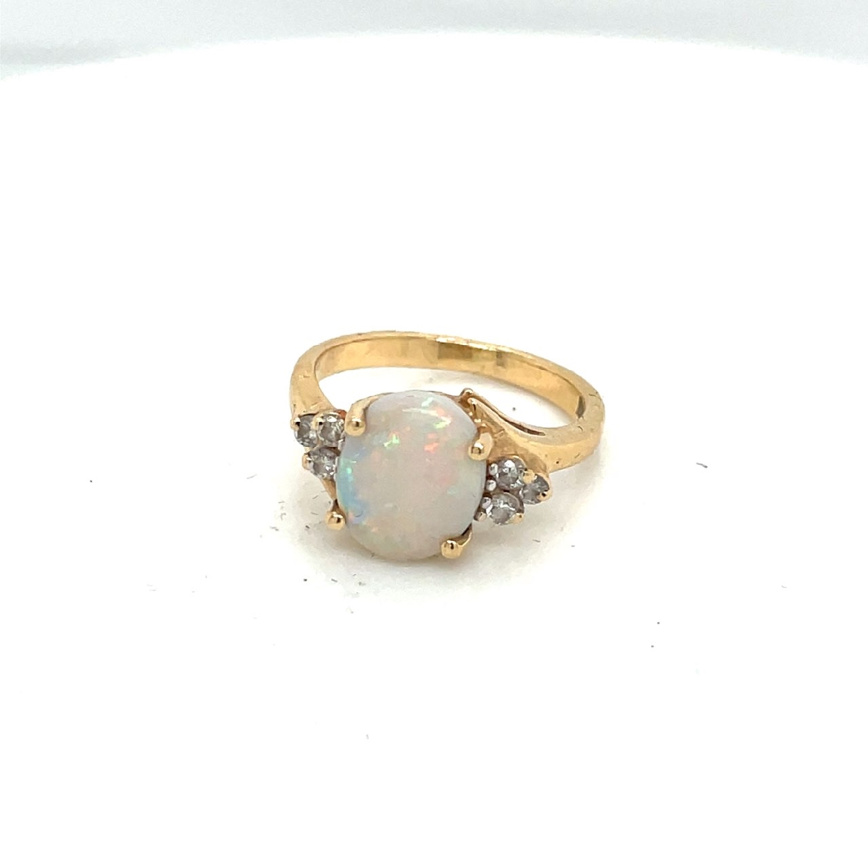 14K Yellow Gold Oval Opal Ring with Diamond Accents

Size 4.75