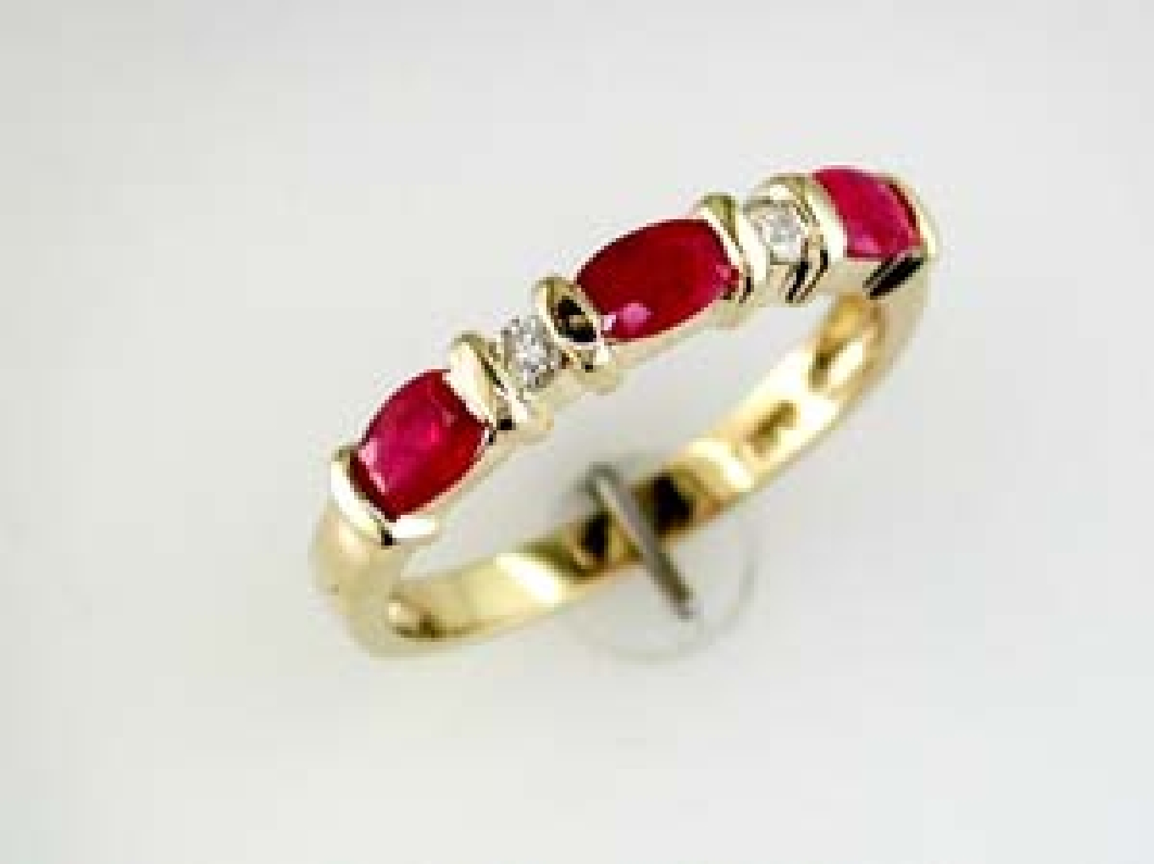 14K Yellow Gold Ruby and Diamond Stackable Band Size 6.75 
.1CT Diamonds 1.0CT Rubies 
3292RB