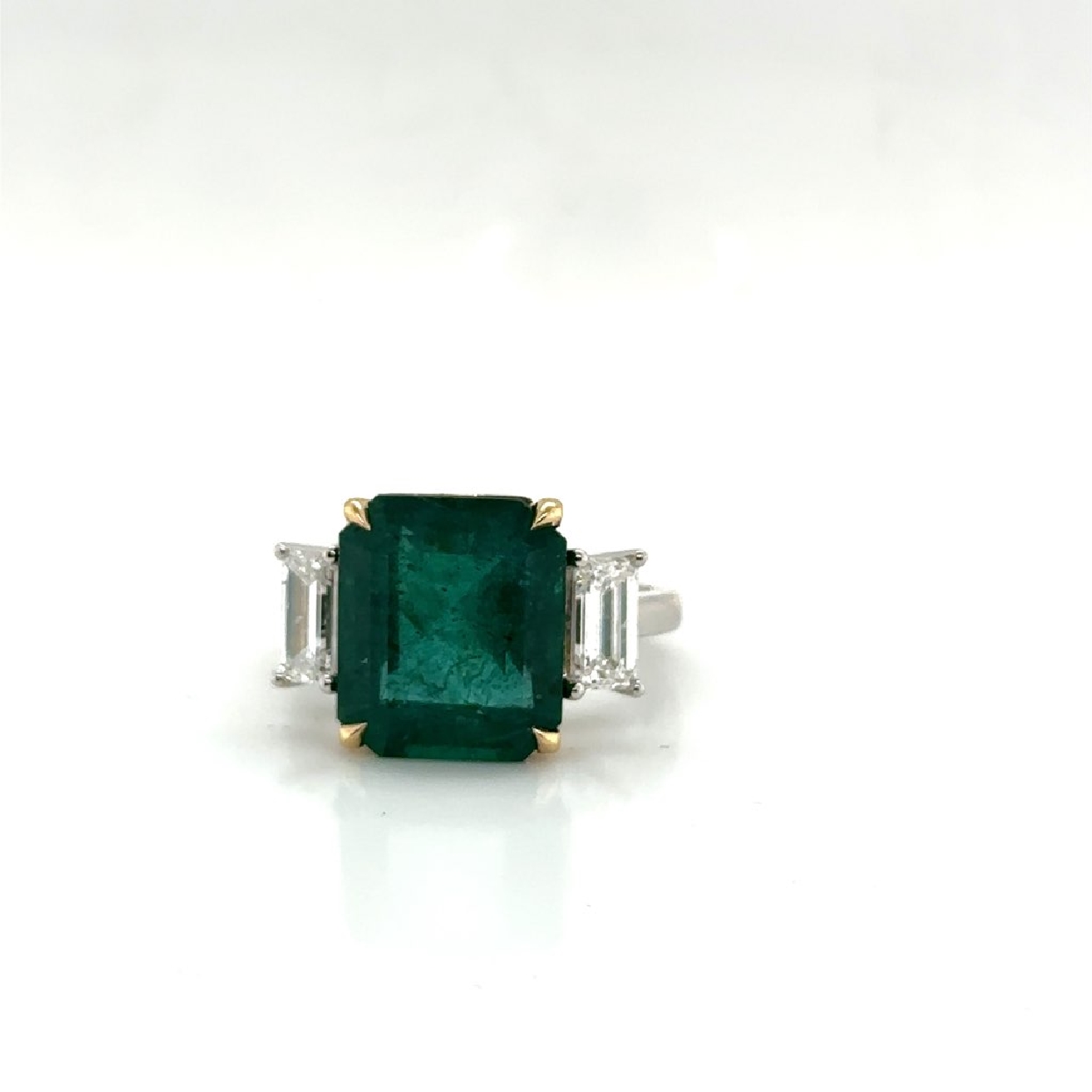 18K White and Yellow Gold Ring with a Square Cut Emerald 7.8 ct and Diamond Baguette Accents 1.24 ct 
Size 7.25 