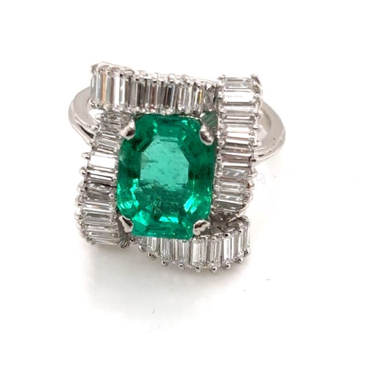 18K White Gold Columbian Octagon Emerald 3.85CT with Baggett Diamond Halo 

Size 6.75

GIA Report on Emerald