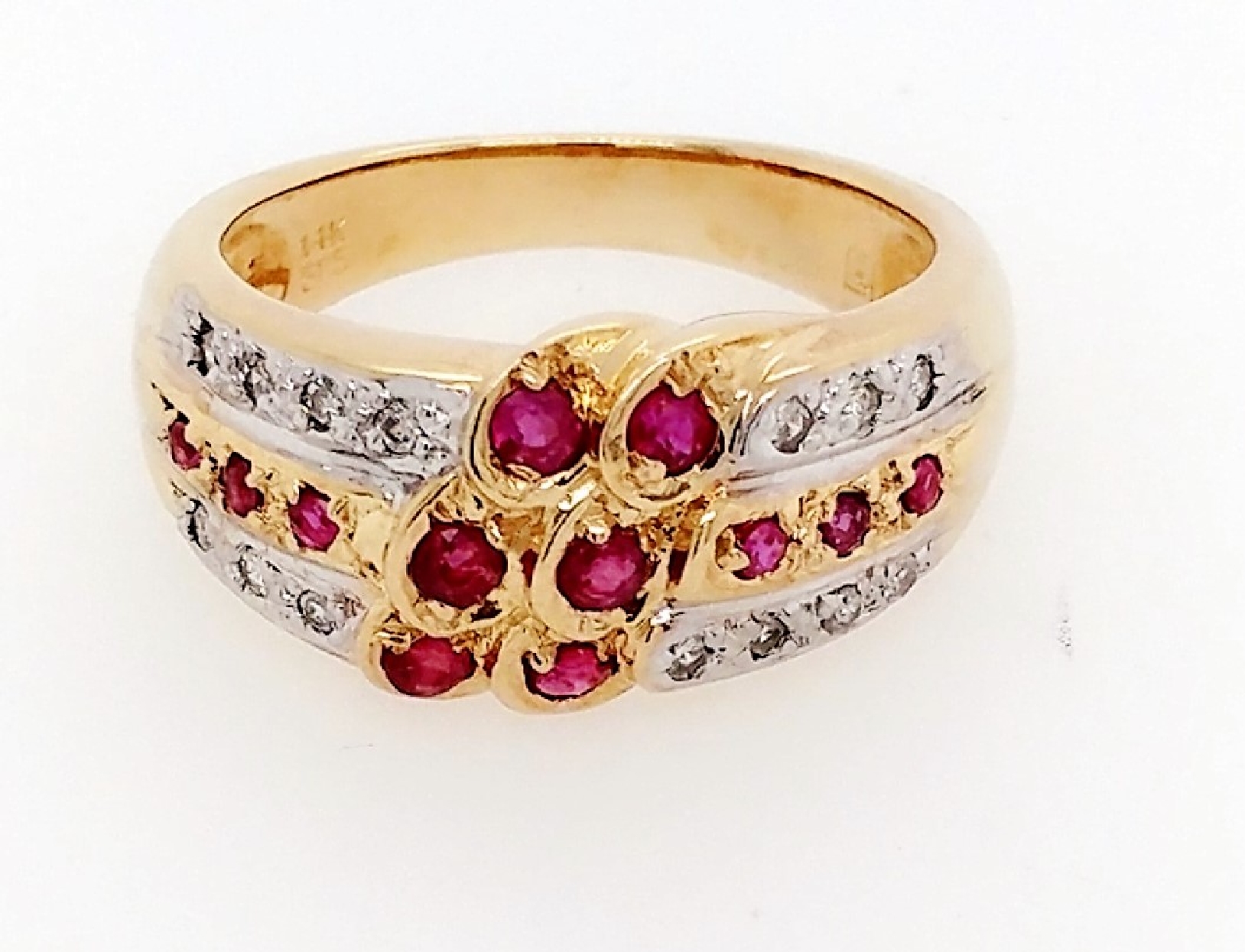 14K yellow gold ring w/ 12 rubies and 14 dias. White gold accents. Sz. 6.5.
