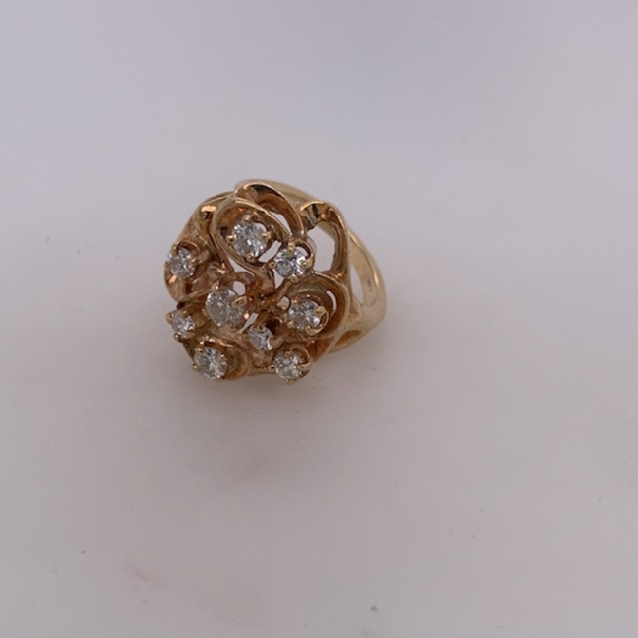 14K Yellow Gold Freeform Ring with Apx. 1.15cttw of Diamond Accents. Circa 1960 s

Size 5.75
