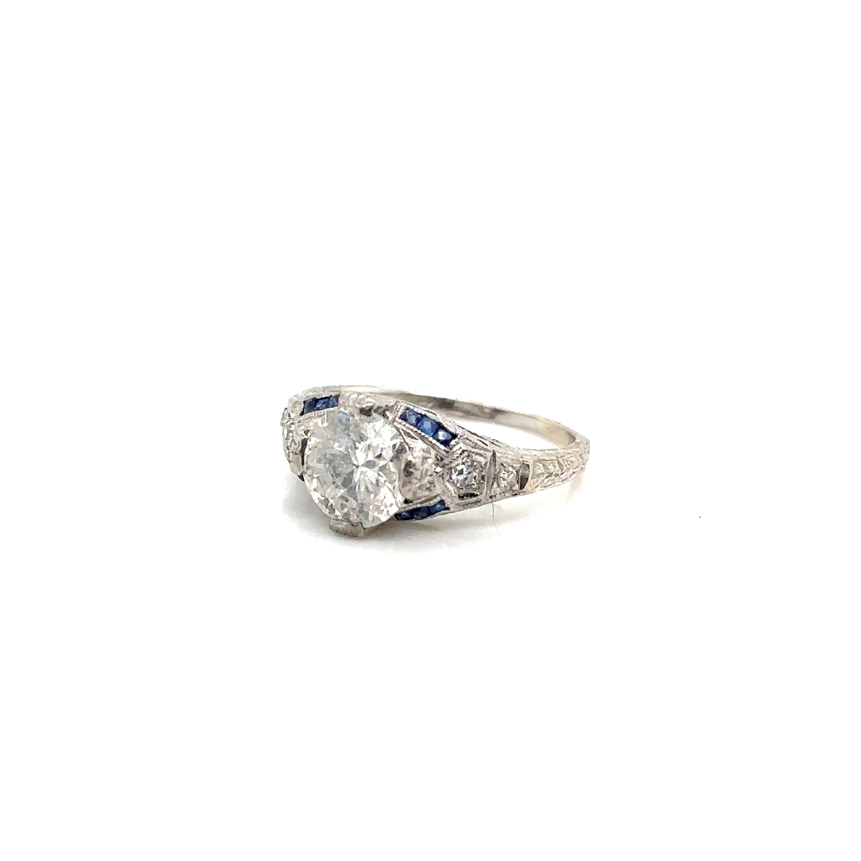 Platinum Art Deco (1920s) Transitional Cut Diamond (1940s) Ring with Channel Set Sapphire Accents and Filigree Details Size 5