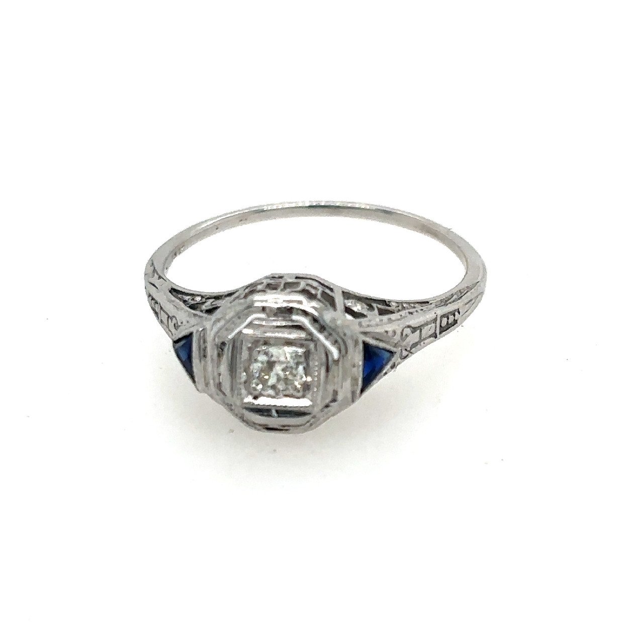 Vintage 18K White Gold Old European Cut Diamond Ring with French Cut Sapphire Accents

Size 4.75