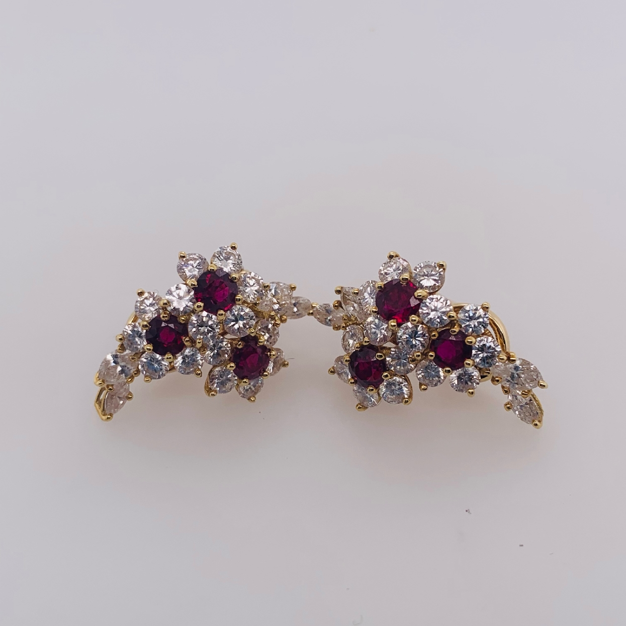 Tiffany & Co. 18K Yellow Gold Cluster Earrings with 3.42 CTTW Diamonds F/VS2 and 0.90 CTTW Rubies Omega Back Clip Ons 

Comes with Original Box and Appraisal