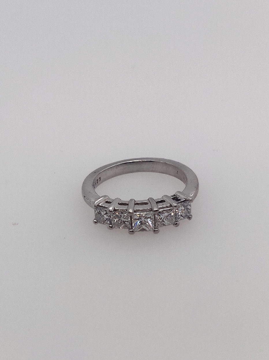 Platinum Engagement Ring with 0.95CTTW of Princess Cut Diamonds. G/VS2 Size 5

Appraisal on File