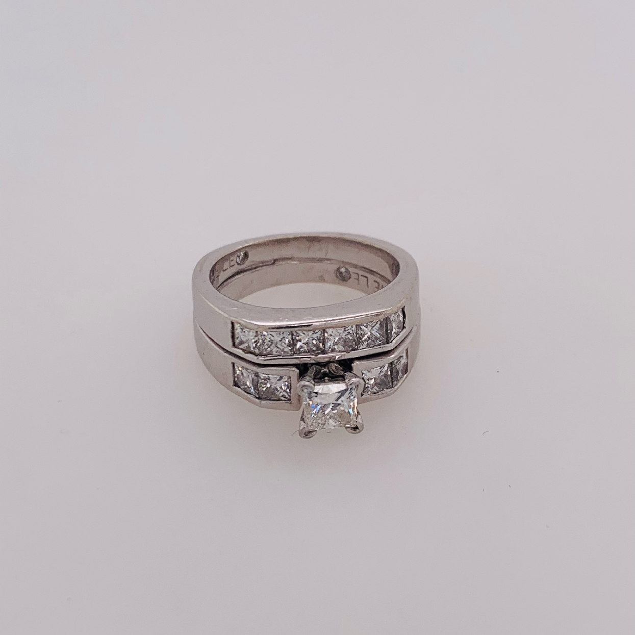 Platinum and 14K White Gold Leo Collection Wedding Set with approximately 1.63 CTTW and 0.51CT Center H/VVS2 Size 5

Comes with Certificate of Authenticity

