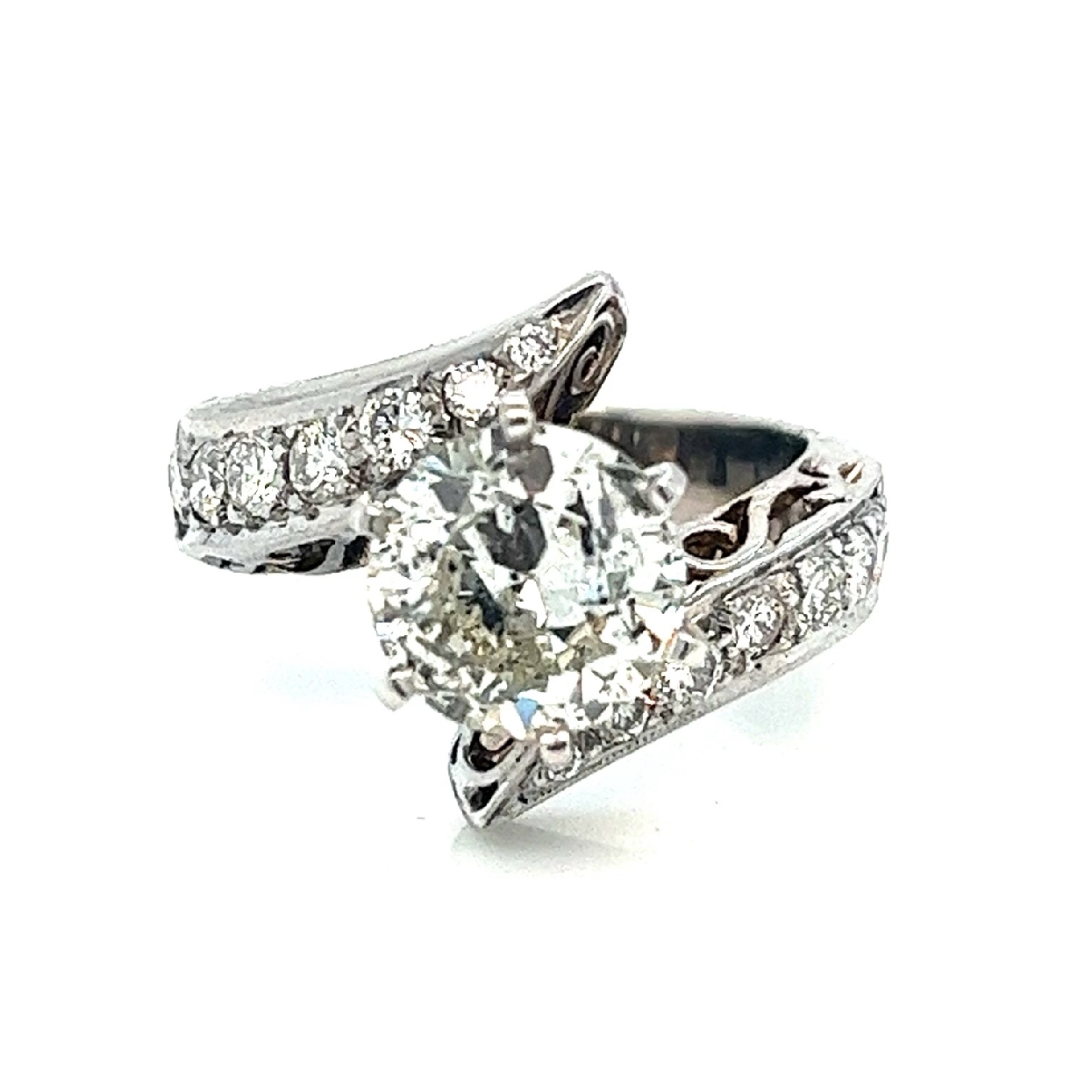14K White Gold Diamond Bypass Ring with a 2CT I2/N Center Stone and Diamonds Accents
Size 6.5