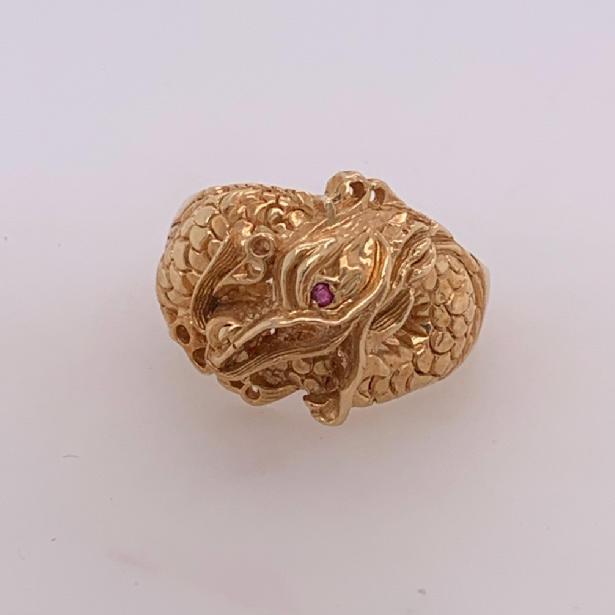 14K Yellow Gold Dragon Ring with Ruby Eye

Size 11.75