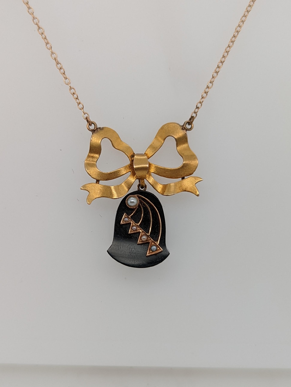 Converted 14K Yellow Gold Victorian Bow Station Necklace with Removeable Black Onyx Dangle and Seed Pearl Accents; 16-18 inches