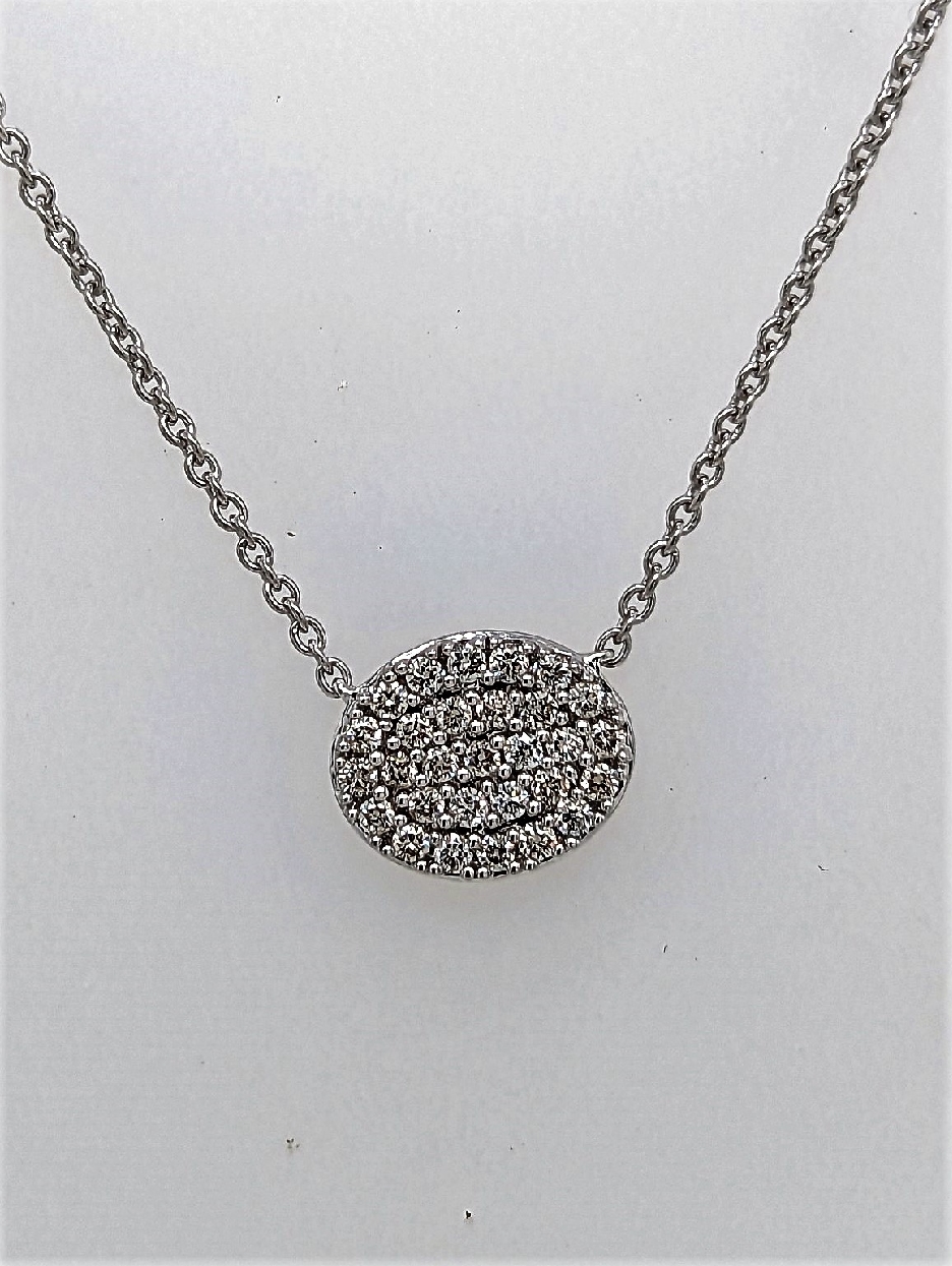 14K White Gold Pave Diamond Oval Stationary Pendant on an 18 inch Chain
0.26CTTW