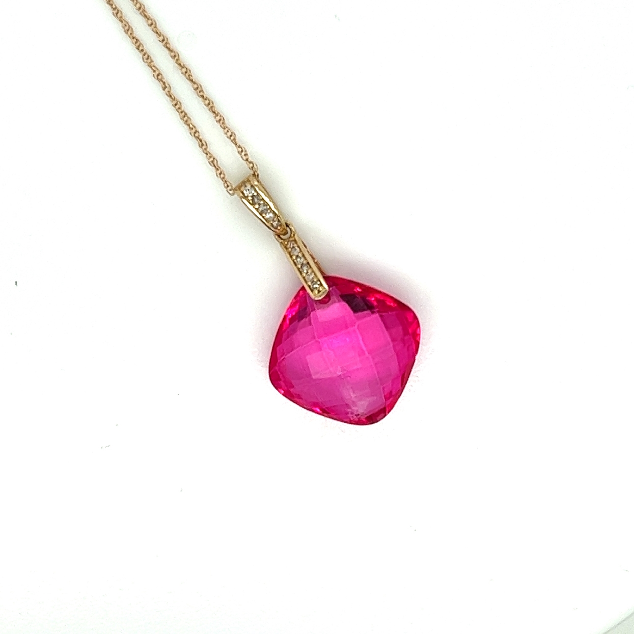 14K Yellow Gold Necklace with Pink Topaz Checkerboard Cut Pendant and Diamond Accents on Thin Rope Chain

18 Inches

