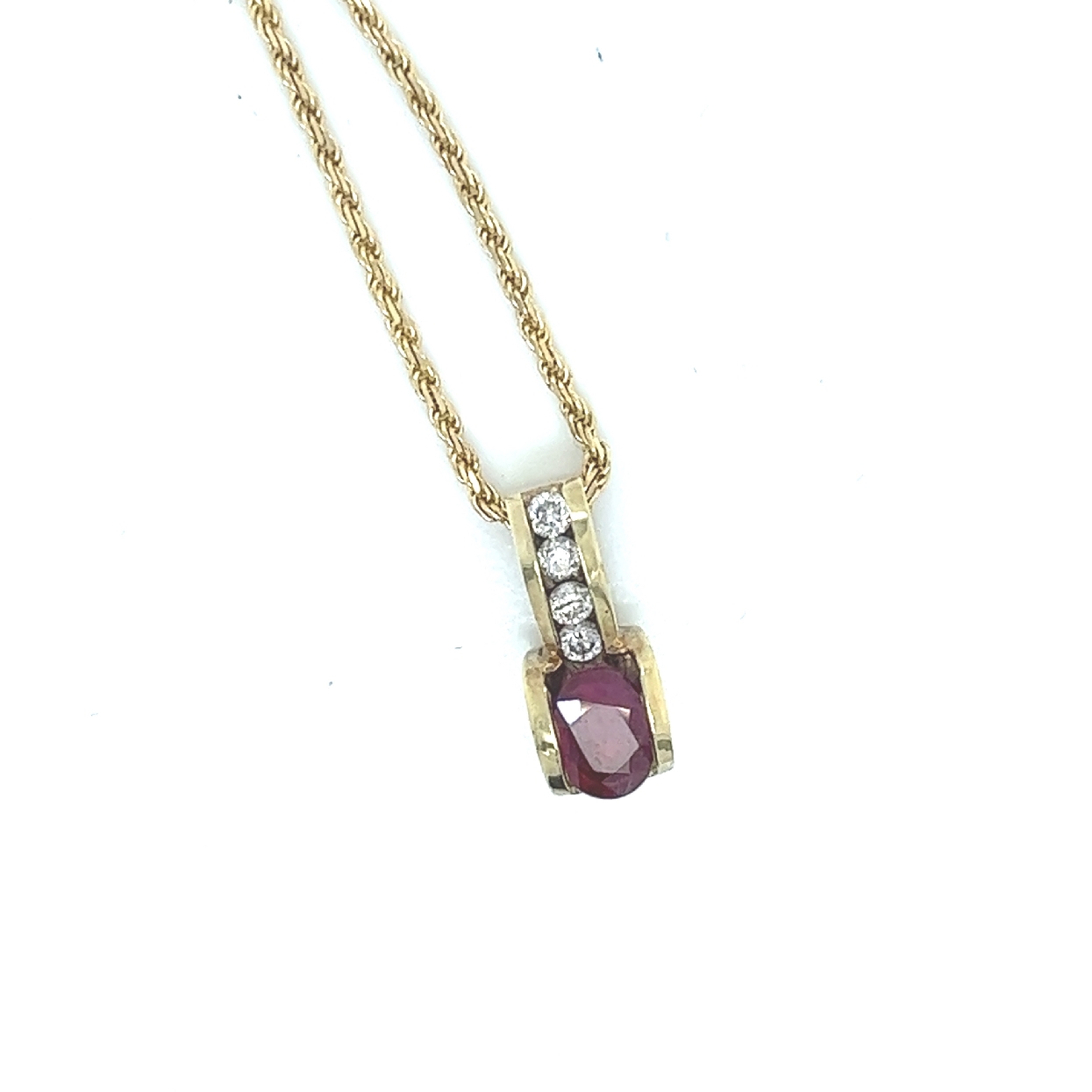 14K Yellow Gold Rope Necklace with Oval Ruby Pendant and Diamond Accents

2.1ct 7x5mm Oval Ruby
4 Round Brillant Cut Diamonds .06cttw SI/I 
18 Inches Total Length 