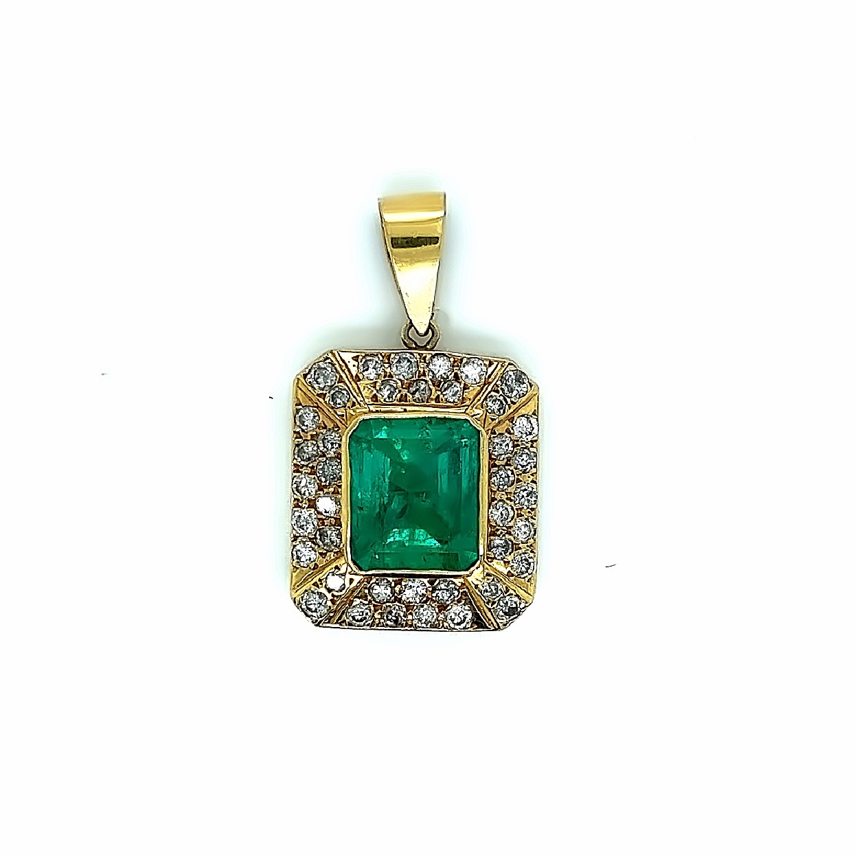18K Yellow Gold Columbian Emerald and Diamond Pendant 1.5 Inches Long X .75 Inch Width

Approximately 7.90CT Emerald and 1.45CT Diamonds