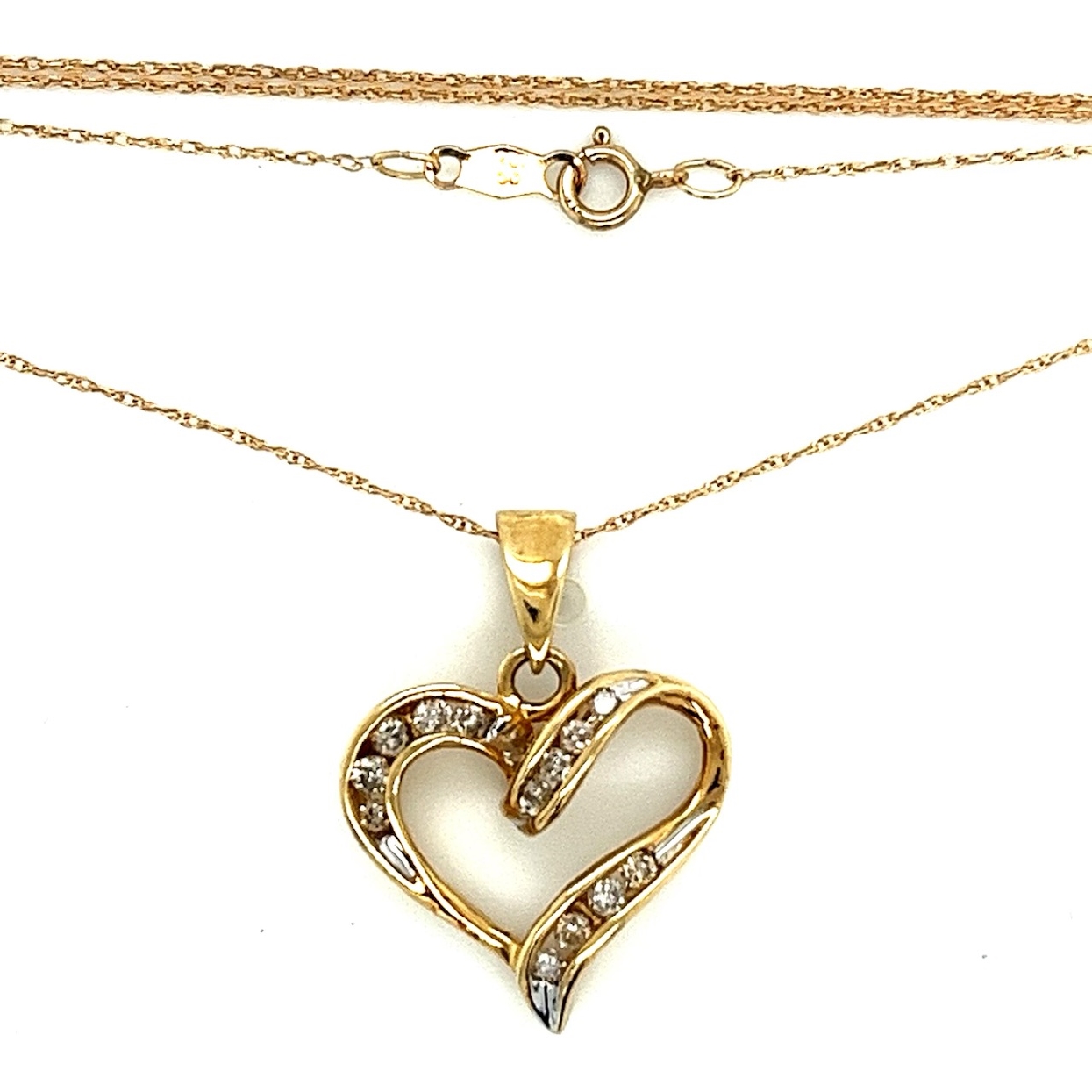 10K Yellow Gold Diamond Heart Necklace 

18 Inches