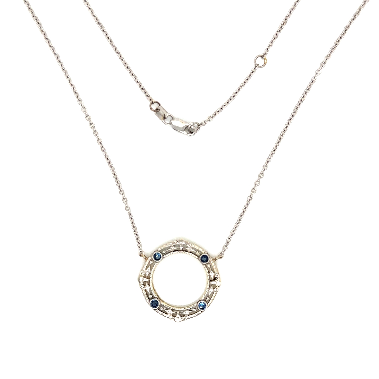 Antique 14K White Gold Circle Pin Conversion Station Necklace With Sapphire Accents; Circa 1910

18 Inches 