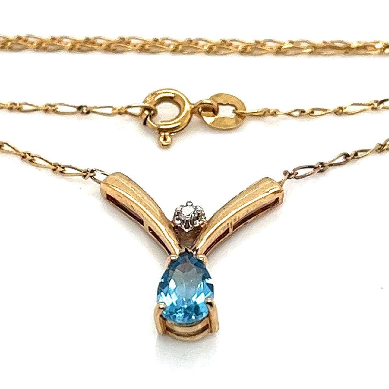 14K Yellow Gold Pear Blue Topaz with Diamond Accent Station Necklace on a 16 Inch Chain 