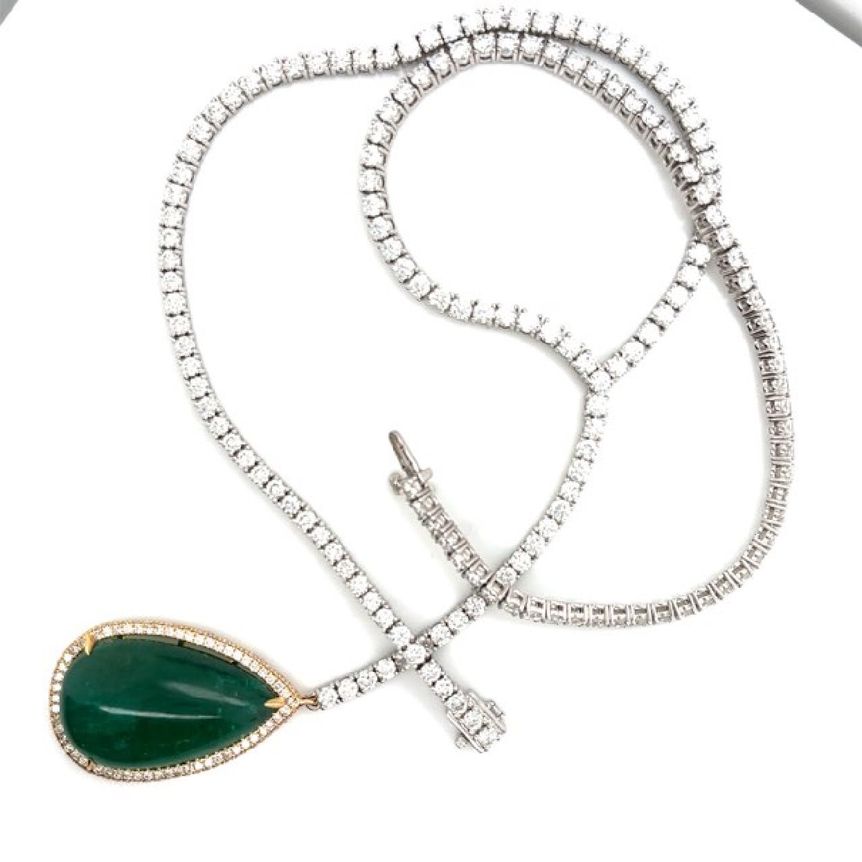 18K White Gold and Platinum Pear Cabochan Emerald 27.36CT on Drop Diamond 12.41CT Chain 

16INCHES 