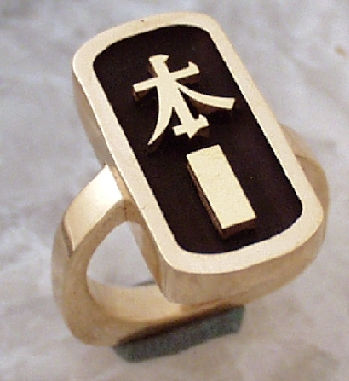 14K yellow gold and black enameling ring with Chinese characters.