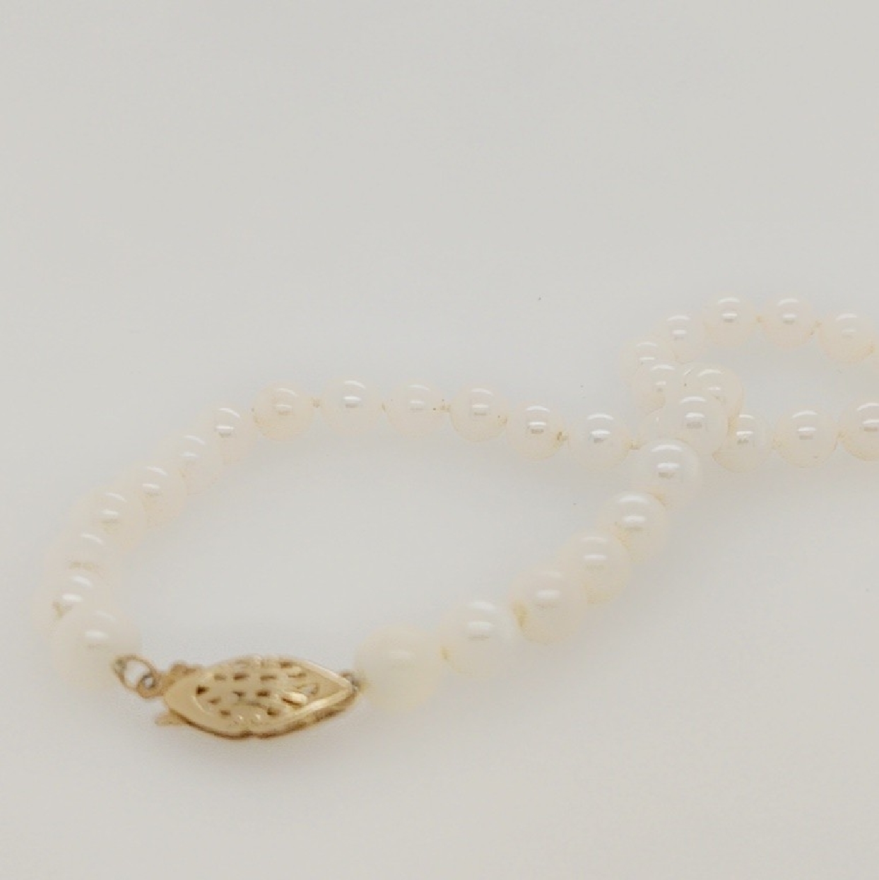 30 Inch Pearl Strand with 14K Yellow Gold Clasp