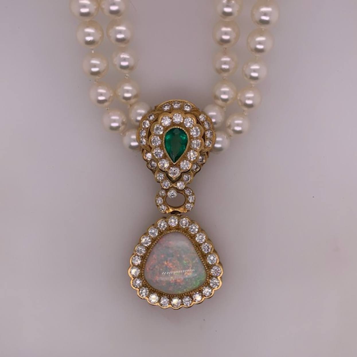 18k Yellow Gold Natural Pear Shaped Emerald and Natural Fire Opal Fixed Pendant with Diamond Halos on a Double Strand Salt Water Pearl Necklace 18  