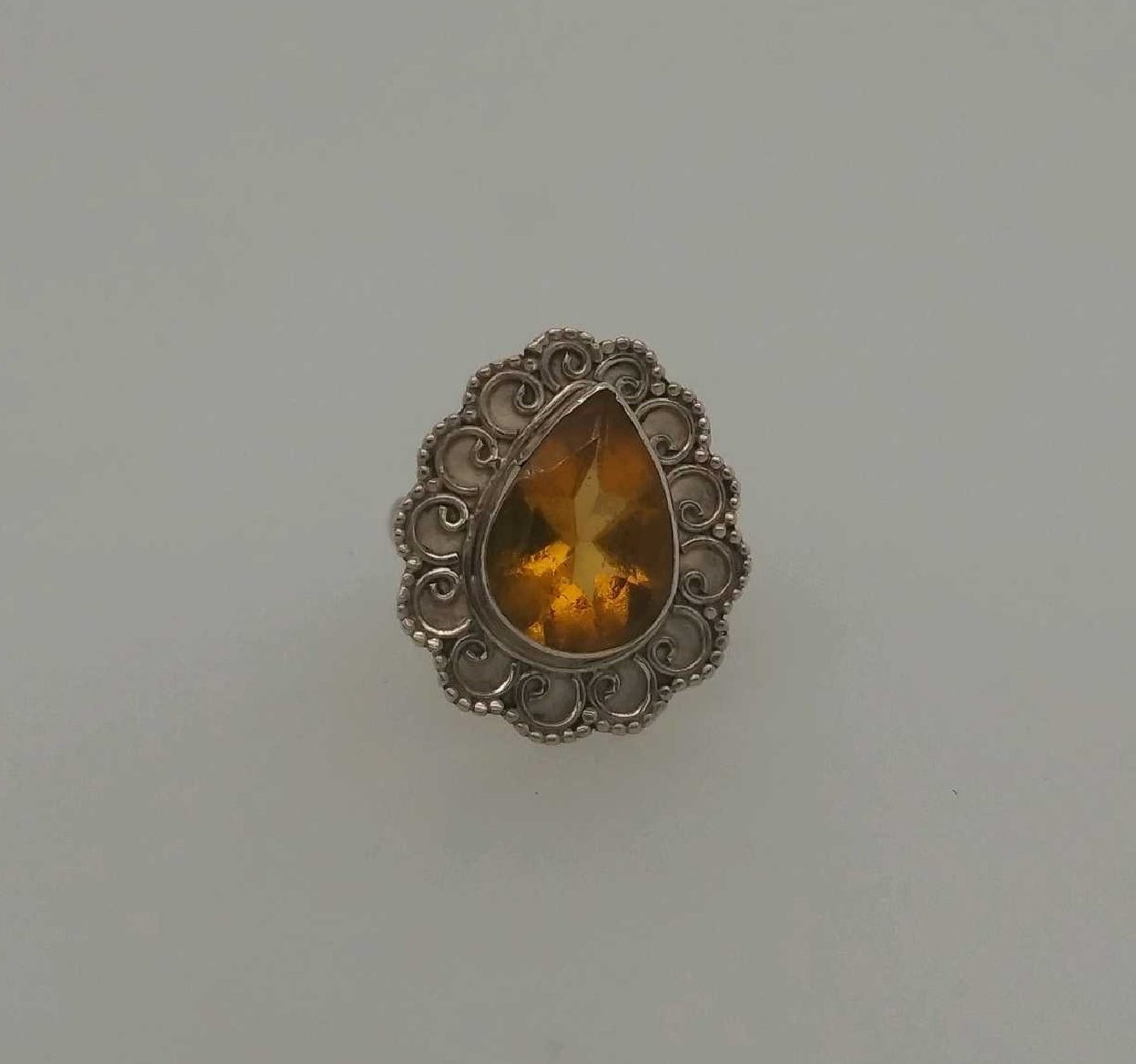 Sterling Silver Bezel Set Citrine Ring With Filigree Style Halo 
Size 6.5
2.8 DWT