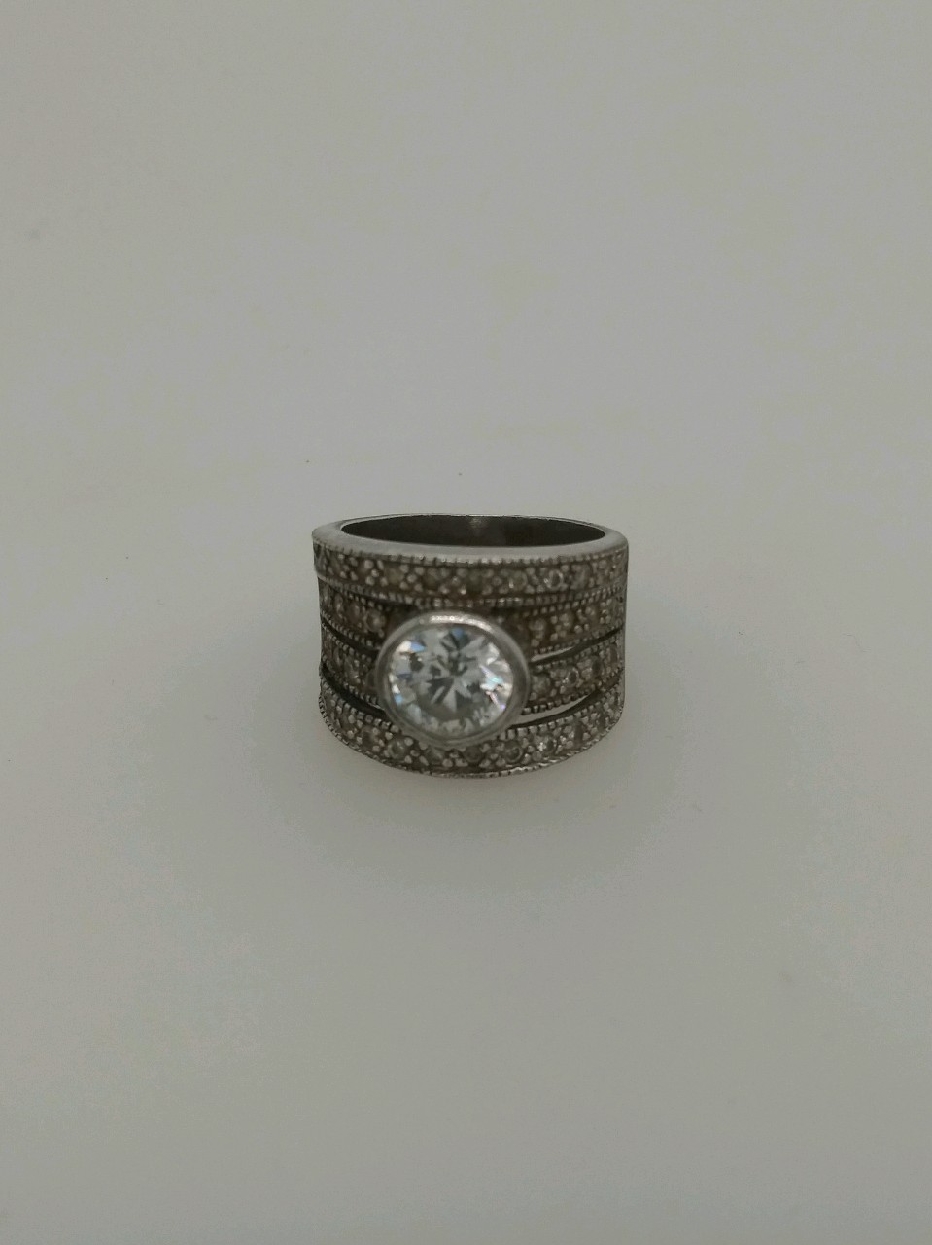Sterling Silver Wide Band with Bezel Set CZ Accent
Size 7