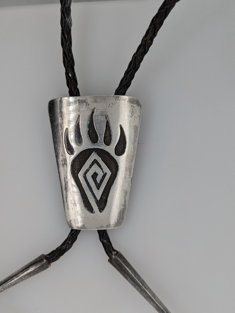 Southwestern Sterling Silver and Braided Leather Bear Claw Bolo Tie