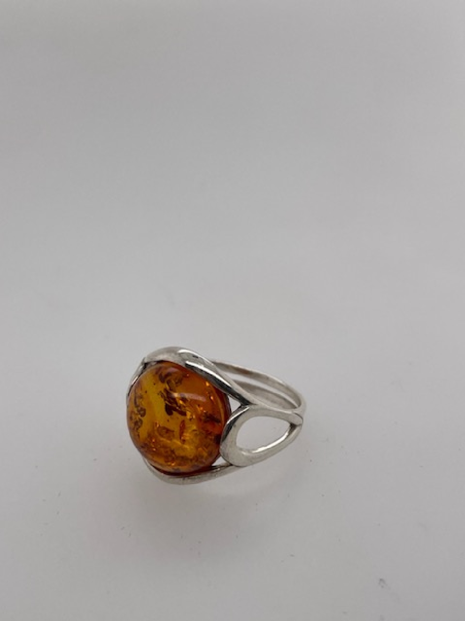 Sterling Silver Ring with Round Amber Cabachon 

Size 8.75