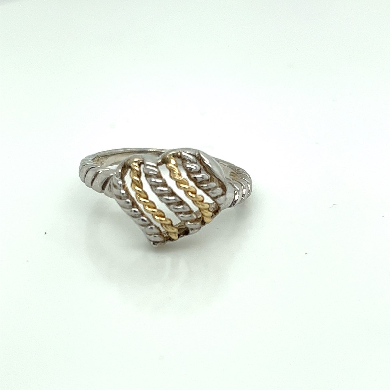 Sterling Silver Heart Shaped Ring with Gold Rope Detail

Size 7.25